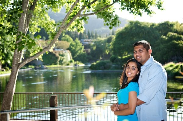 Engagement Portrait of Indian Couple in front of a lake at Gilroy Gardens