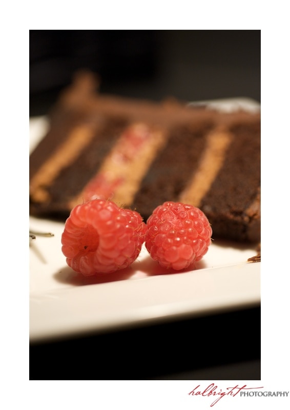 Chocolate Wedding Cake slice with two raspberries | San Francisco LGBT Wedding - San Francisco Wedding