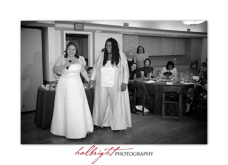 Two brides speaking to their guests at their wedding reception | LGBT - Oakland Wedding - Joaquin Miller Park and Community Center 