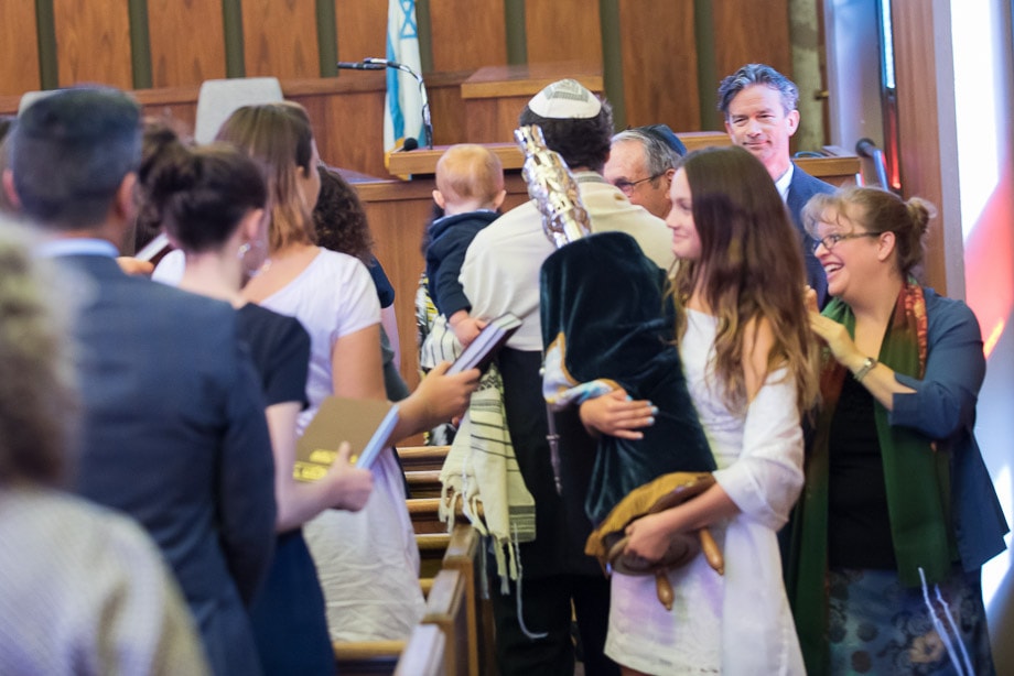 Zoe Waxman carries the torah during the torah service in her Bat Mitzvah at Temple Or Shalom, San Francisco