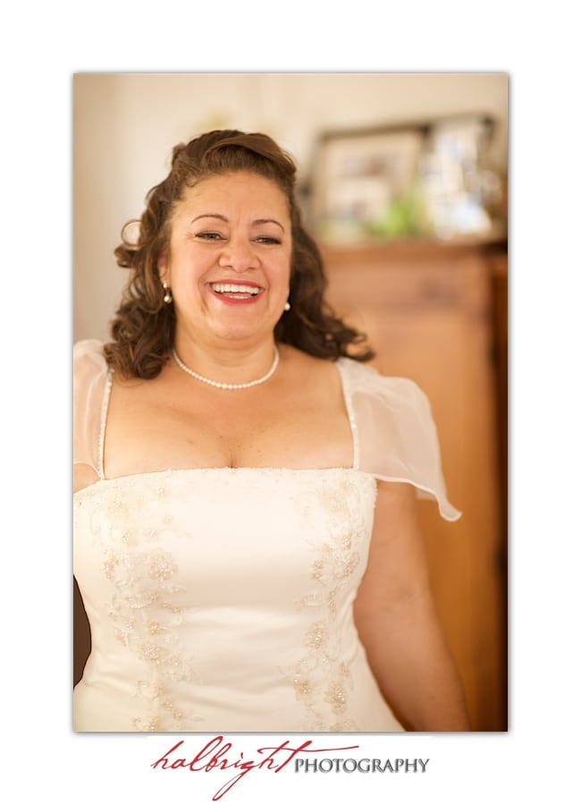 Bride in her wedding dress - getting ready - hotel room - Oakland wedding