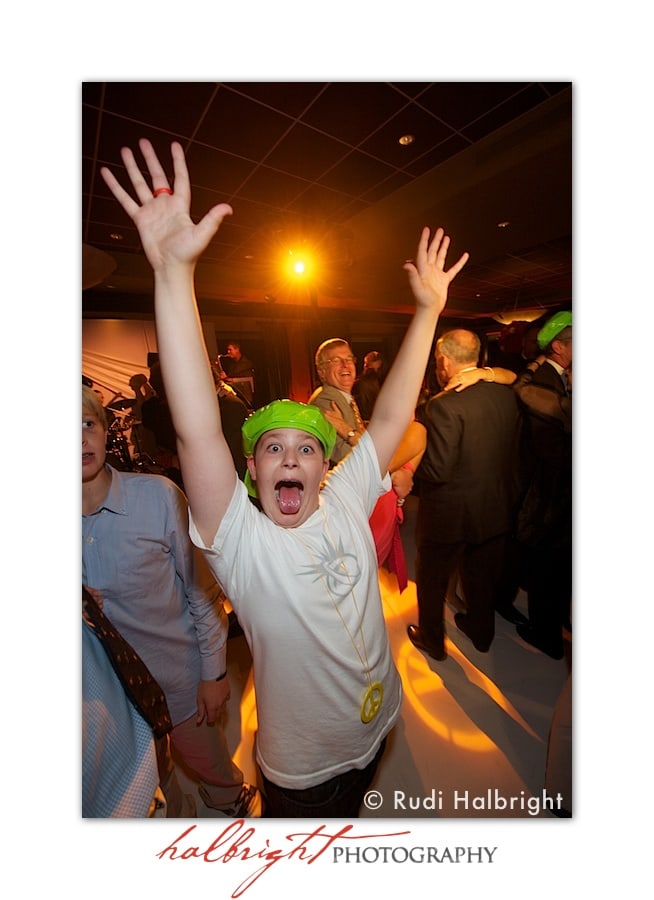 Boy raises his hands up high while on dance floor at Lake Merced Golf Club Bat Mitzvah Party