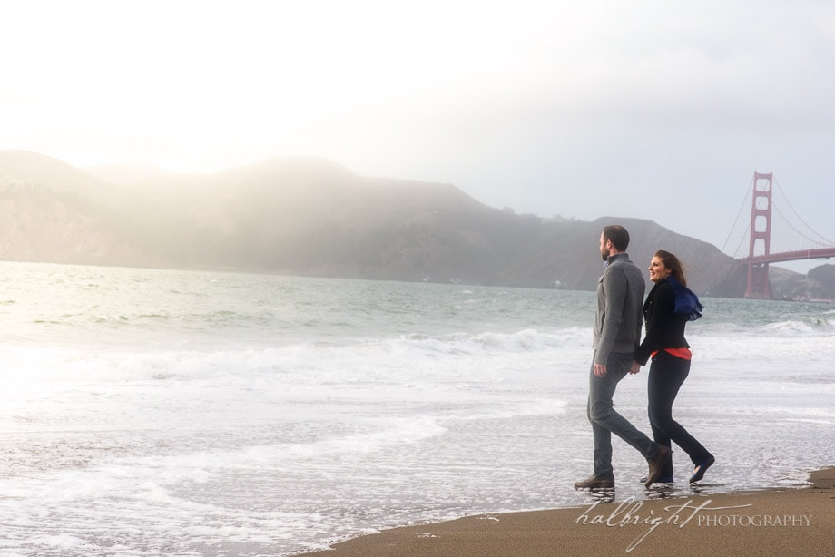 Couple photographed in front of Golden Gate Bridge in San Francisco's Baker Beach | Engagement Portrait - Baker Beach - San Francisco Engagement Photographer