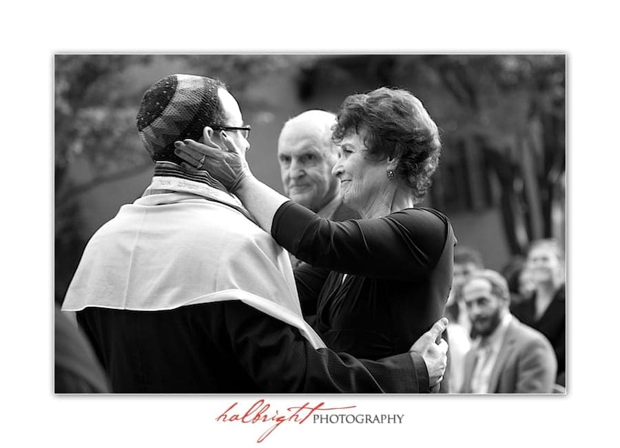 The Groom's mother and father greet him on his wedding day | UC Berkeley Faculty Club - groom wears a Yarmulke and Tallis