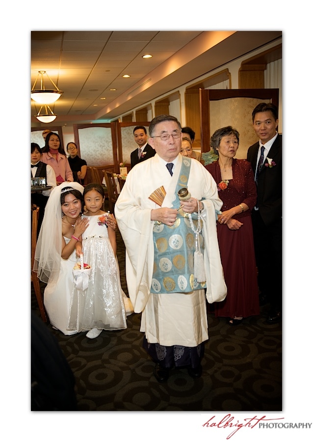 Priest leads the bride to the ceremony - East Ocean Restaurant