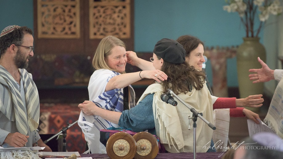 Bat Mitzvah Janie hugs Julie Batz, Service co-leader - Chochmat Halev - Berkeley