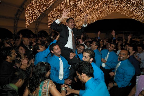 Groom is raised up by friends and family - Indian Wedding - Gilroy Gardens Wedding